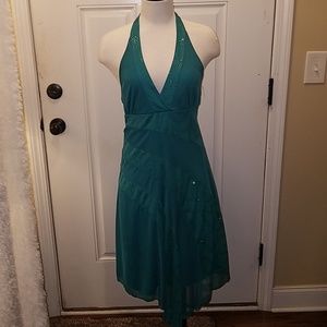 Shimmery green open back dress